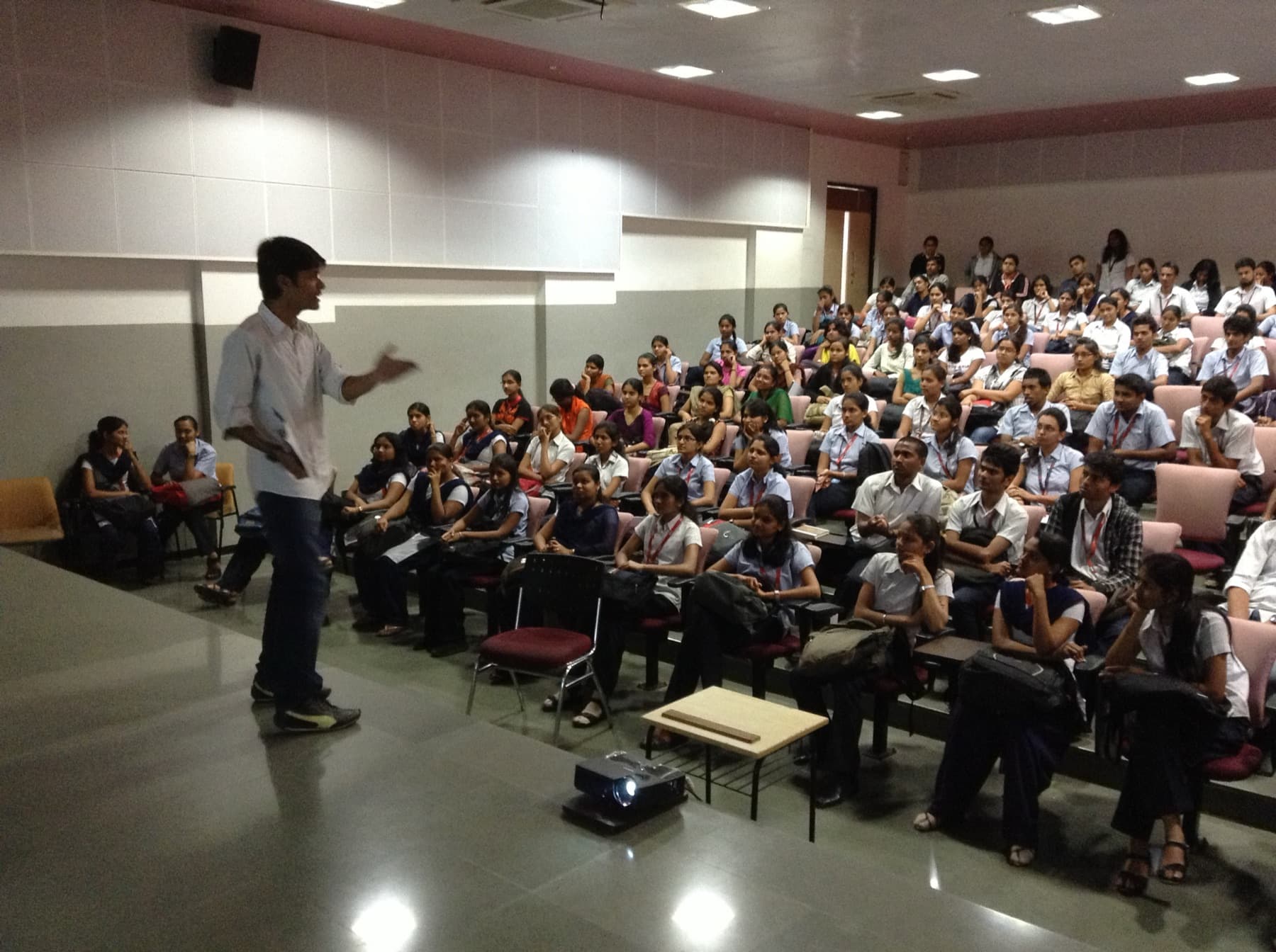 Speaking to a full auditorium