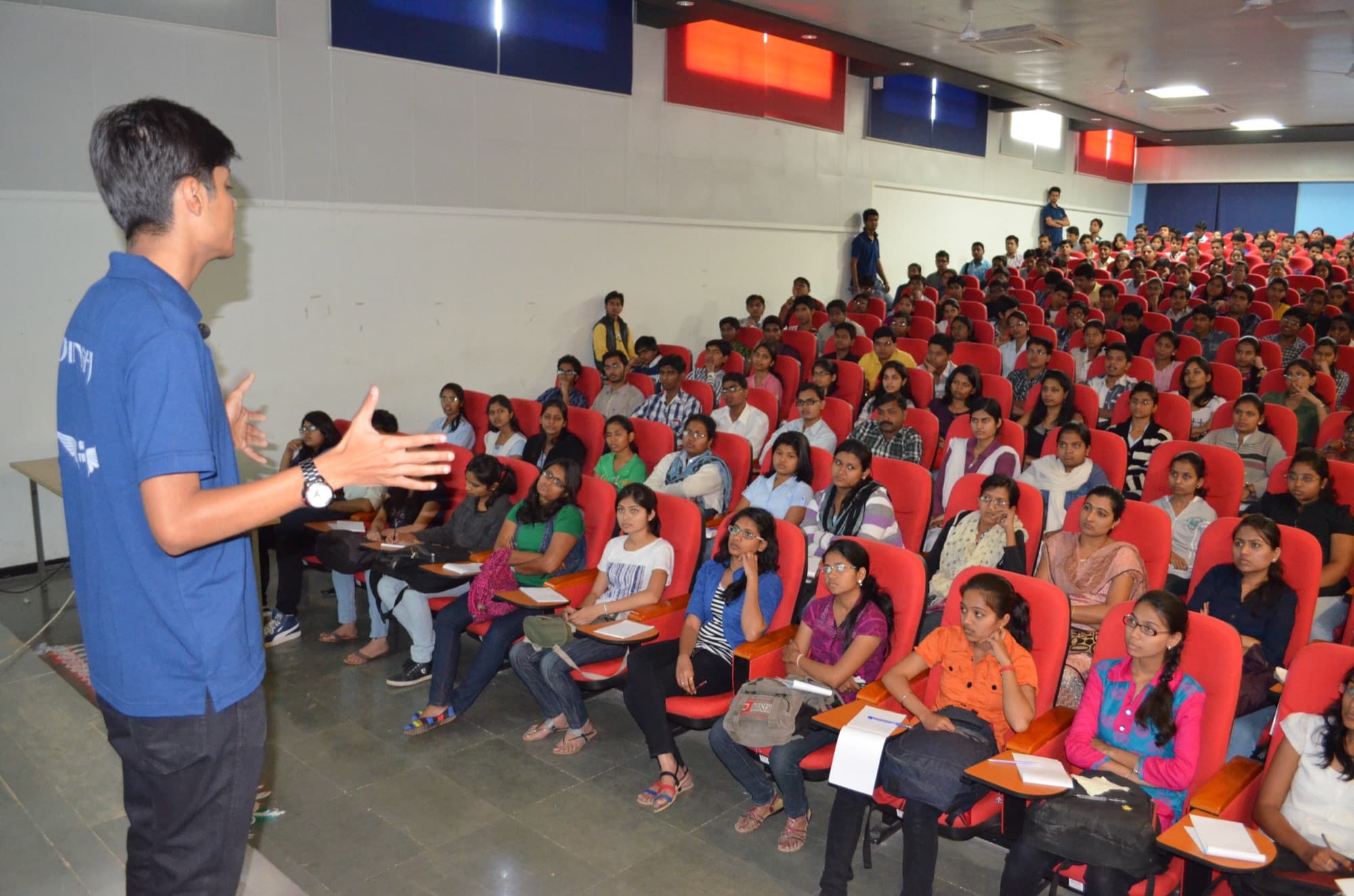 Dinesh Modi speaking to participants at the national-level workshop