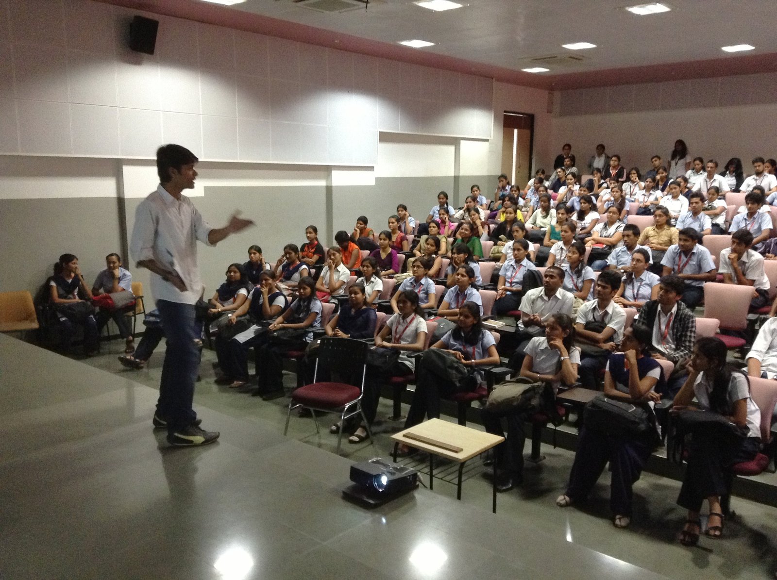 Dinesh Modi speaking to students during a Weave Your Web workshop